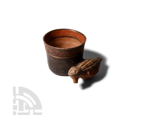 3rd century B.C.-7th century A.D. A polychrome ceramic pouring vessel or whistling vessel with a roughly barrel-shaped bowl a