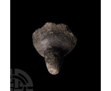 10th-11th century A.D. A ceramic oil lamp fragment comprising a shallow bowl with facetted outer face and a supporting spigot