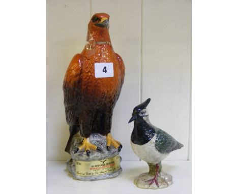 A Beswick figure of a lapwing 2416, together with a Beswick Beneagles Whisky decanter in the form of a golden eagle.