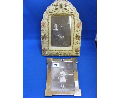 Two vintage photograph frames comprising an embroidered example with gold, silver and copper thread and a brass example of Ar