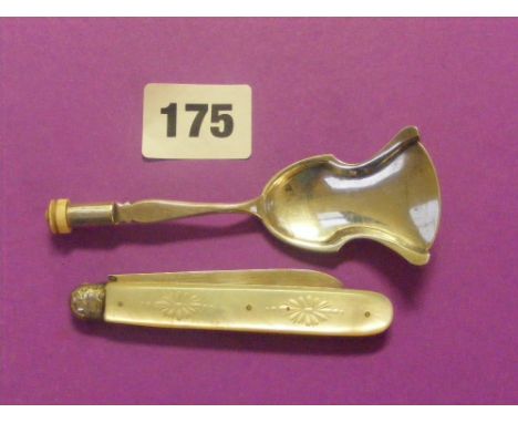 A mother of pearl and silver fruit knife, the mother of pearl is engraved and has a silver shield with monogrammed silver bla