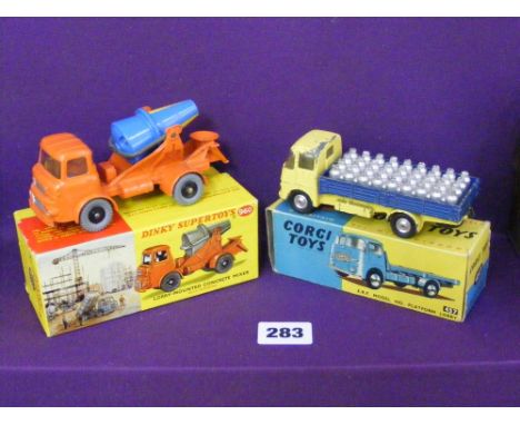 A Dinky Supertoy 960 lorry-mounted concrete mixer, mint, plus a Corgi 457 E.R.F. Model 44G platform lorry, both boxed.