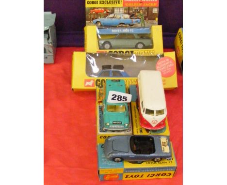 Three Corgi die-cast cars No. 433 V.W. delivery, 318 Lotus and 485 Mini Countryman, all in fair condition, plus a Corgi Golde