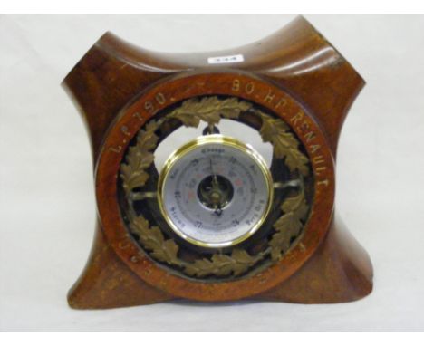 A WWI propeller boss from 80HP Renault BE26 Night Fighter/Light Bomber with a brass cased barometer surrounded by oak leaves 