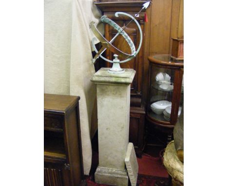 A painted brass sundial on stone plinth.      