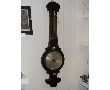 A Victorian barometer with integrated thermometer by J. Beaven of Enfield.
