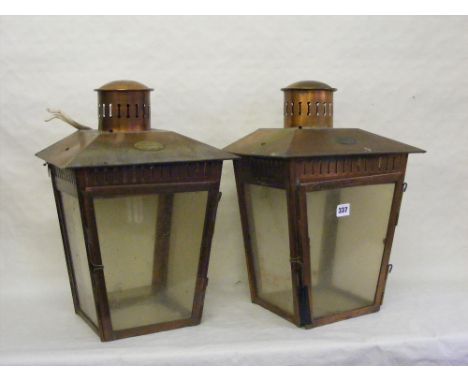 A pair of vintage copper garden lamps by D.W. Windsor of Hoddeston Herts.