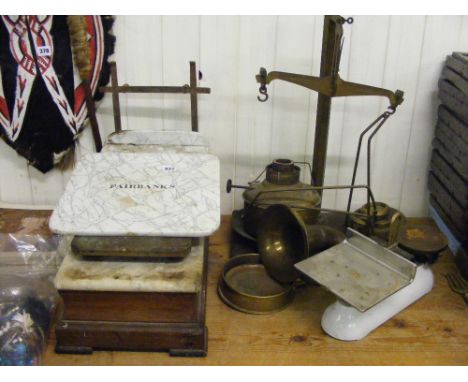 A pair of vintage scales with marble top, two sets of scales, a spirit burner, a brass horn and a knife polisher etc.