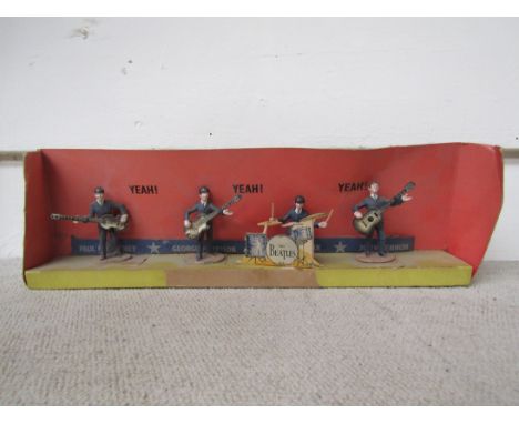 THE BEATLES: A full set of four Subbuteo figures of The Beatles including Ringo's drum kit, inner box only