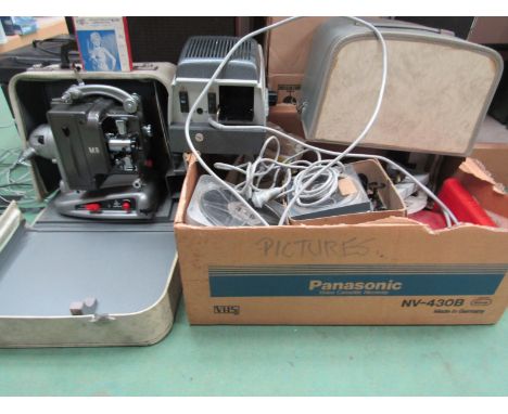 A Bolex-Paillard M8 projector, Braun slide projector and assorted film reels, books etc