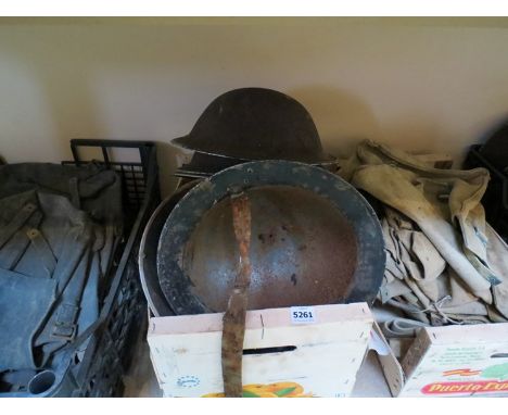 A box of mixed British helmet shells including type II