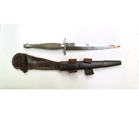 A Fairburn Sykes Commando dagger second pattern, marked '56 with broad arrow, associated sheath 
