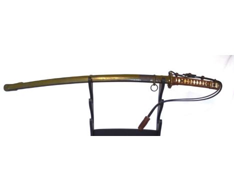 A Japanese military sword (Gunto) circa 1935-43 Army Arsenal Type 95 NCO's.  The sword bears arsenal markings to hilt and bla