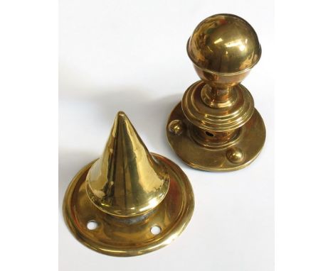 Two brass helmet spikes