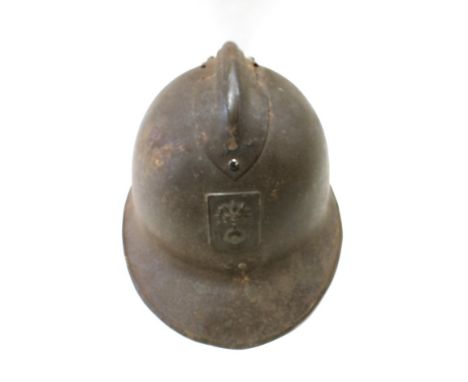 A WWII era French helmet with lining, DP badge to front 