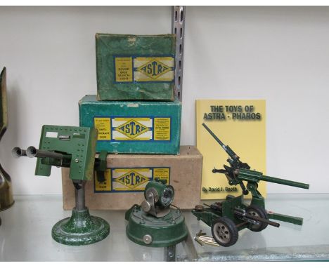 Four vintage Astra - Pharos model toys including pompom, searchlight, Anti Aircraft gun and Anti Tank gun, together with a co