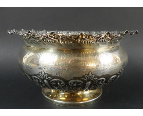 A Victorian silver rose bowl, the flaring rim and lower bowl chased and embossed with scrolling foliage, the body engraved 'P