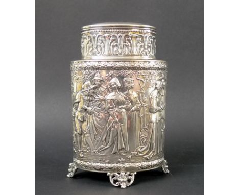 A German silver tea caddy, early 20th century, of oval section cylindrical form, embossed with figural fete galante decoratio