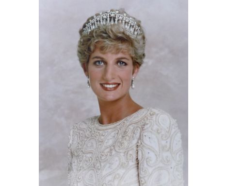 A signed photographic portrait print of 'Diana, Princess of Wales', wearing a cream beaded jacket and tiara, signed by Prince