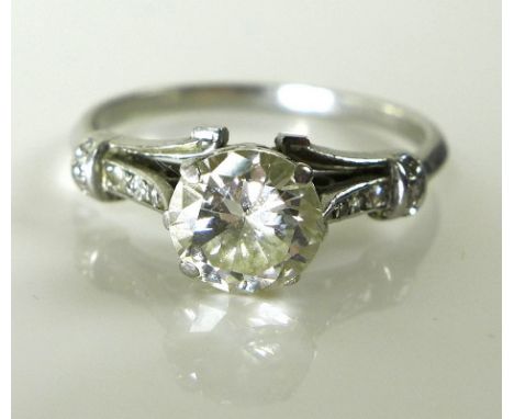 A platinum and diamond solitaire ring, the brilliant cut stone of approximately 1.1ct, approximately 6.69mm diameter by 4.18m