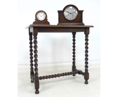 An Edwardian box wood strung and walnut mantel clock, 20.5 by 8.5 by 17cm high, a 1930's oak mantel clock, 33 by 14 by 25cm h