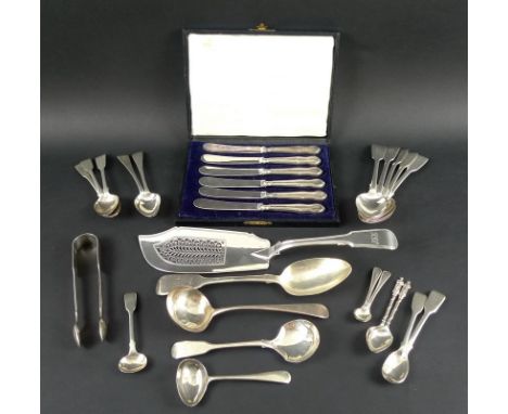 A group of Georgian and later flatware comprising a set of six butter knives with silver handles and plated blades, Sheffield