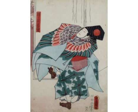 A Japanese 19th century woodblock print of a gentleman of court, inscribed with a red seal mark, 35 by 25cm, glazed and frame