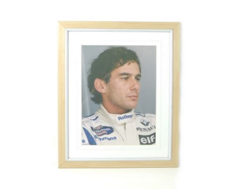 Two Louis Hamilton signed photographs and a further two signed by Louis Diaz and Robert Kubica, together with a David Coultha