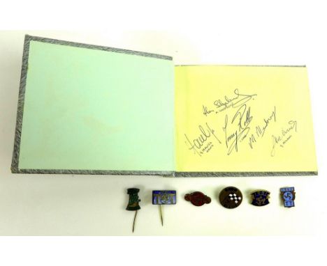 An autograph album containing signatures of racers and celebrities from the Isle of Man TT, likely collected between 1957 and