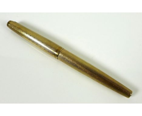 A 9ct gold Parker 61 fountain pen, with engine turned body and cap, pearlised ends, body engraved with 'P.P.R. 1945-1966', PP