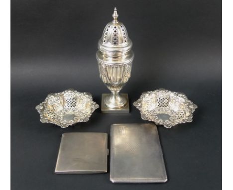 A collection of George V and later silver including an oversized sugar sifter, the fluted body chased and embossed with swags