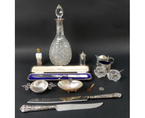 A selection of silver and vertu including a silver collared hobnail cut glass decanter, Birmingham 1919, John Grinsell & Sons