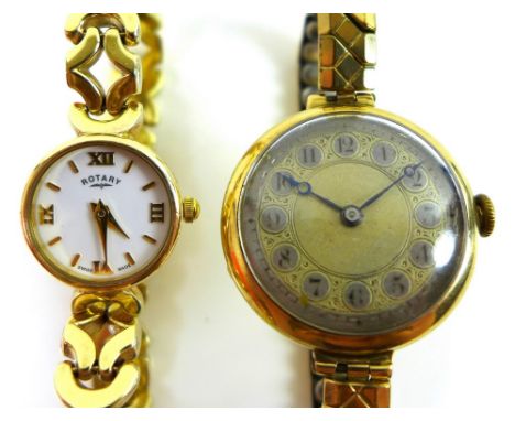 A lady's 15ct gold cased wristwatch, with Arabic numerals and silvered dial, 25.2g total weight, together with a lady's 9K go