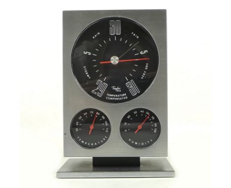 A Taylor USA weather station, circa 1960, with barometer, thermometer and hygrometer, in a wooden and brushed steel case, 12 