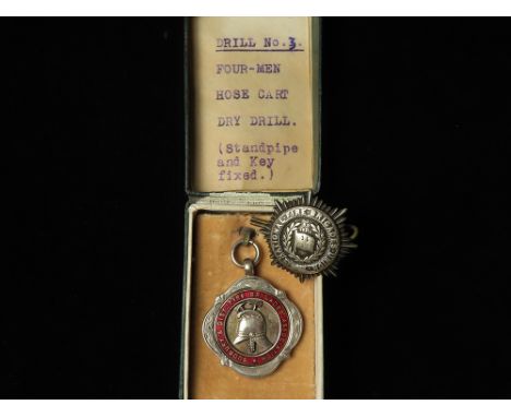 Suffolk interest: Sudbury &amp; Dist. Fire Brigade Association enamelled, hallmarked silver fob to 'Motor Pump Drill Runner U