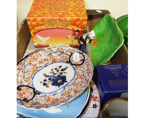 A Royal Doulton Harry Potter figure, Wizard-In-Training, HPFIG7, boxed, a Royal Doulton figure, Patch In Basket, DM9, boxed, 