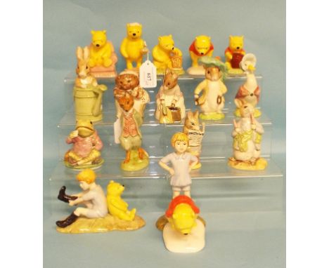 Eight Royal Doulton Winnie-the-Pooh figures, including Christopher Robin, WP9, and Winnie The Pooh In The Armchair, WP4, and 