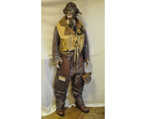 EXTRA LOT: An RAF WWII full leather flying suit, comprising flying jacket, trousers, with map pocket containing various maps,