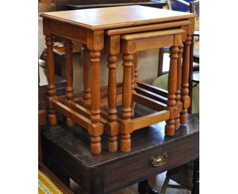 A nest of three oak tables, two card tables, a cake stand, and a standard lamp (5)