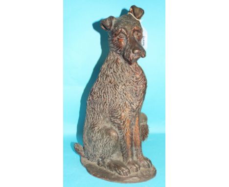 A fireside compendium, in the form of a seated terrier (lacks tools), 39 cm high Condition report Report by GH

Stamped 'MADE
