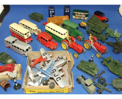 A Dinky Toys Massey-Harris tractor, another, other Dinky commercial and military vehicles, aeroplanes and other die-cast toys