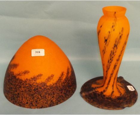 A mottled glass lamp base, with stylised decoration, and associated shade, 27 cm high
