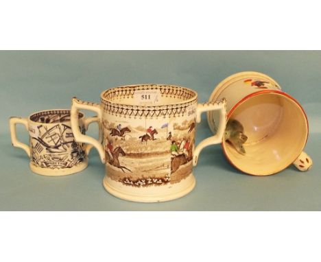 A loving cup, decorated hunting scenes, 12.5 cm high, a Prattware style frog mug, 12.5 cm high, and four others (6) 