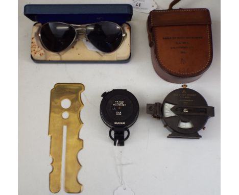 A J H Stewart Ltd angle of sight instrument, dated 1916, in a leather carrying case, a T G Co Ltd compass, a pair of Air Mini