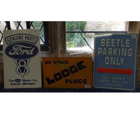 A Ford V8 Genuine Parts sign, a Beetle Parking Only sign and a Lodge Plugs enamel sign, some damage (3)