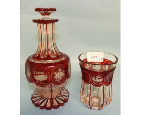 A Bohemian ruby flash glass decanter and stopper, with etched decoration, 20.5 cm high, with a matching tumbler (2)