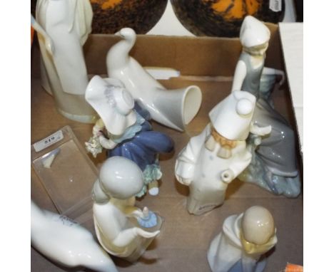 A Lladro figure, of a girl carrying a basket, 21 cm high, and others similar (box)