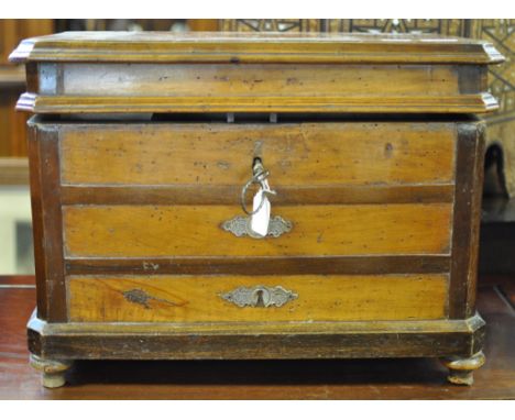 A 19th century French box, in the form of a commode chest of drawers, on bun feet, 55 cm wide