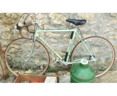 A Peugeot Super Competition 12 speed gentleman's racing bicycle, constructed from Reynolds 501 tubing with chromed forks, qui