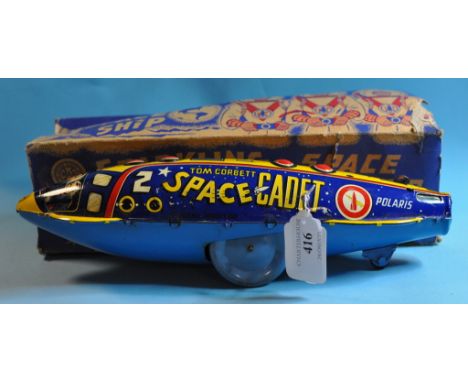 A Louis Marx Tom Corbett Space Cadet 2 Sparkling Space Ship, boxed (a.f.) Condition report Report by MW

The key wind mechani